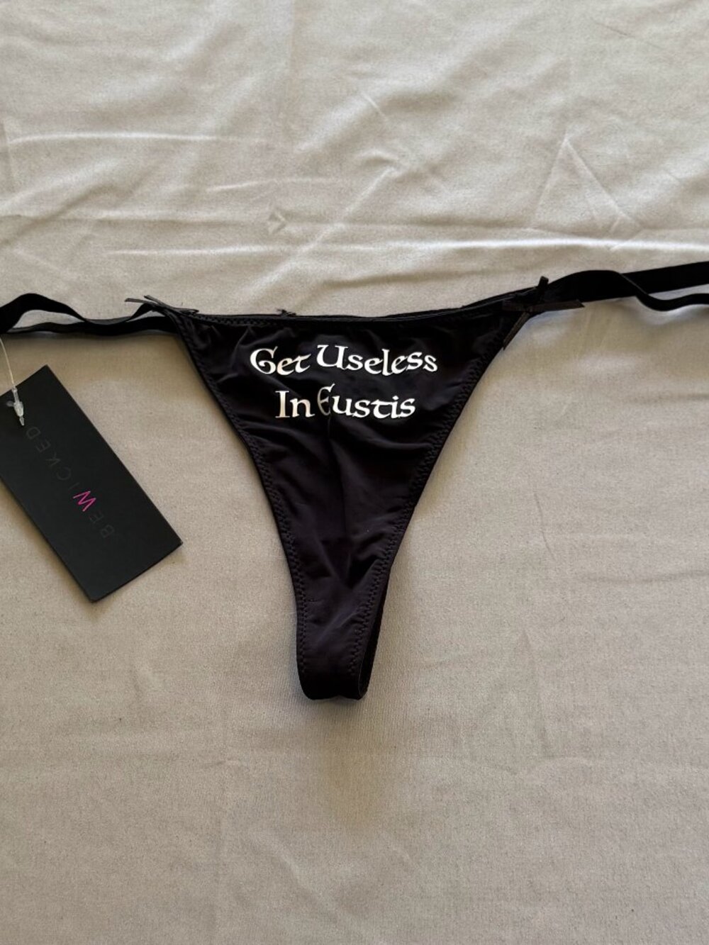 Woman’s New With Tags BeWicked Thong Black Size X-Large with Vinyl Decal & Bows